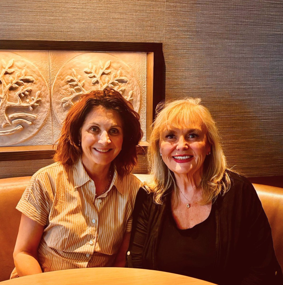 Dallas Brodie and Kerry-Lynne Findlay seated together at dinner